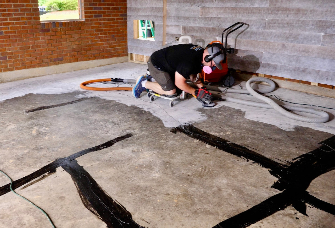 Grinding garage floor crack repair