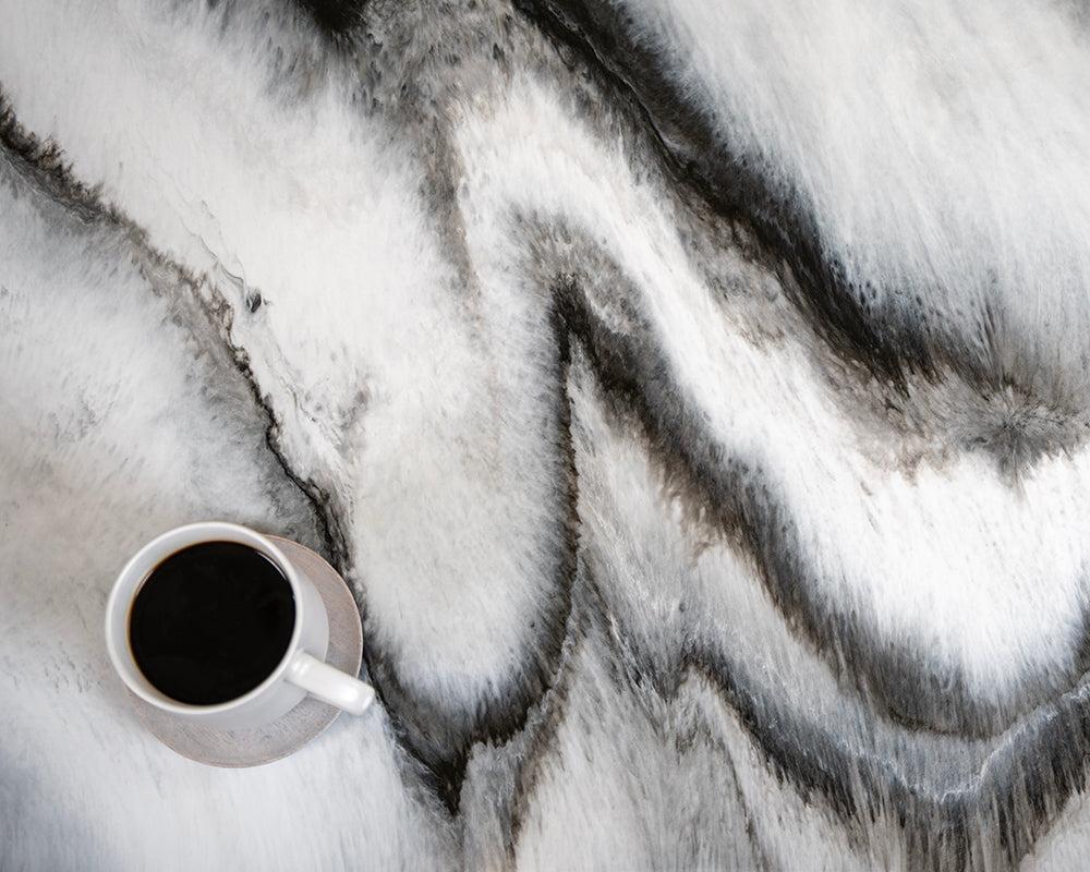 White Exotic countertop with a cup of coffee