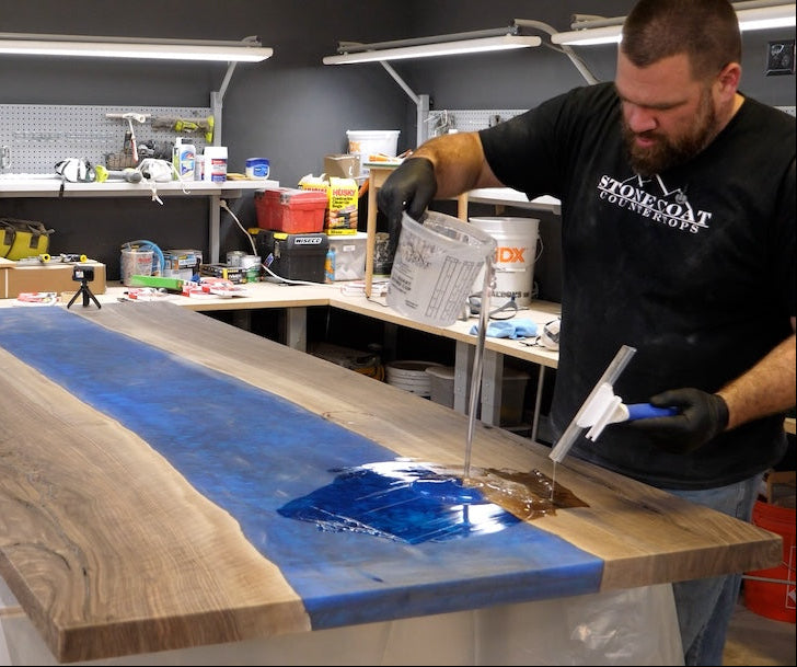 apply seal flood coat on top of completed epoxy river table