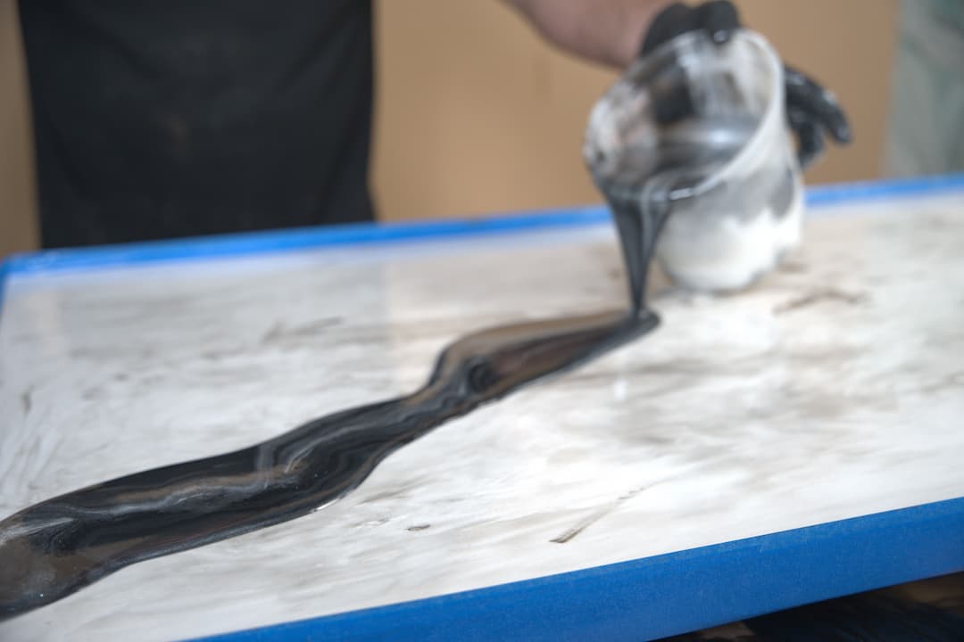 Pouring of a black epoxy strip