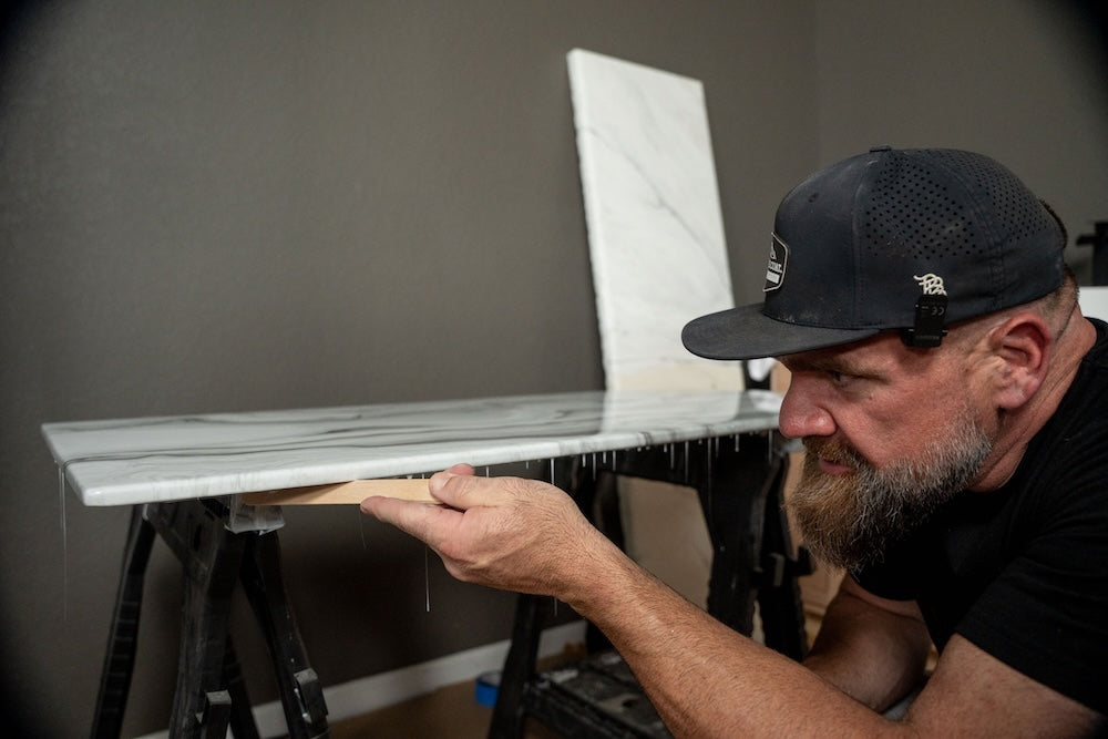 scraping polyaspartic drips under counter edge