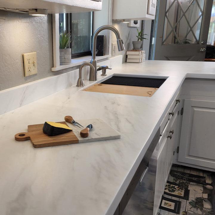 Discover the elegance of Stone Coat Epoxy's White Carrara Marble countertop finish. Achieve stunning white marble looks in your kitchen or bathroom with our DIY-friendly formula. Step-by-step instructions and a UV-resistant Art Coat Epoxy ensure long-last