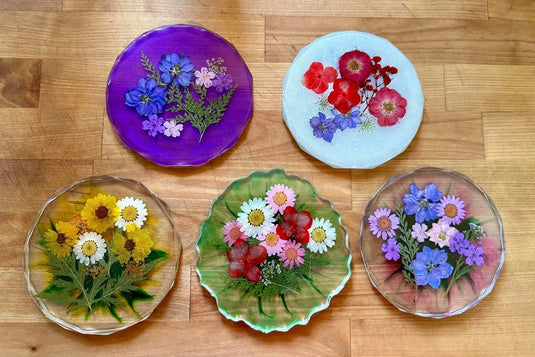 Epoxy coasters with flowers in them