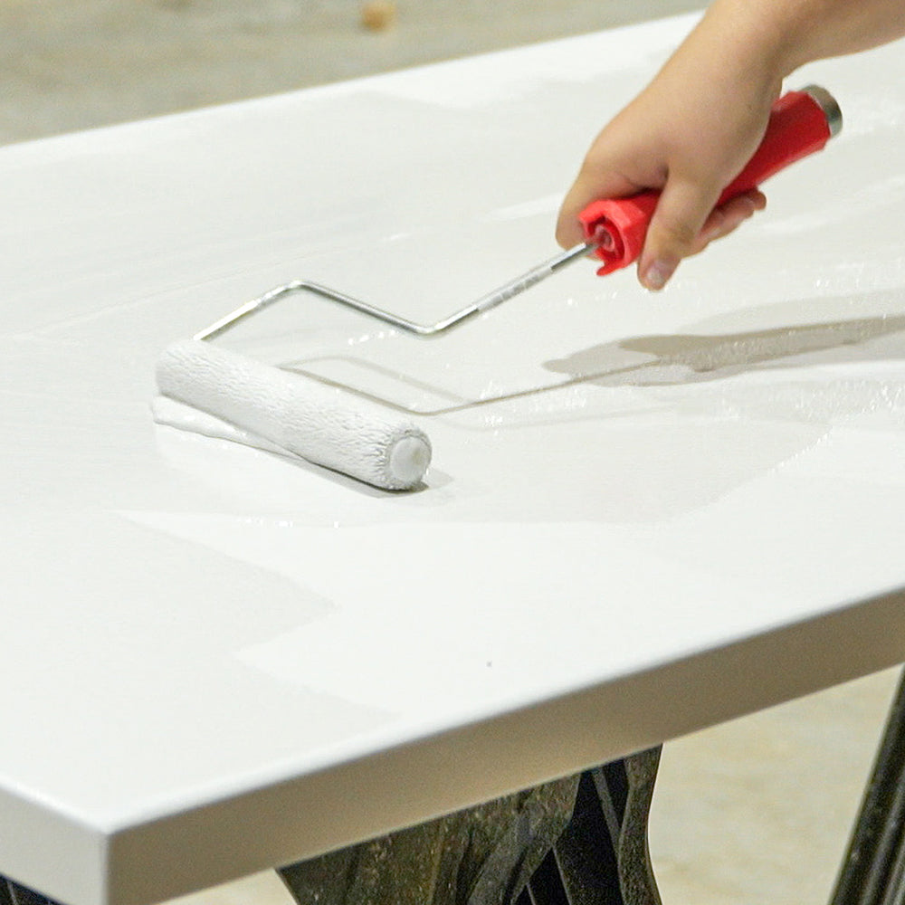 APEX Poly Fuse Countertop primer rolled onto a countertop surface