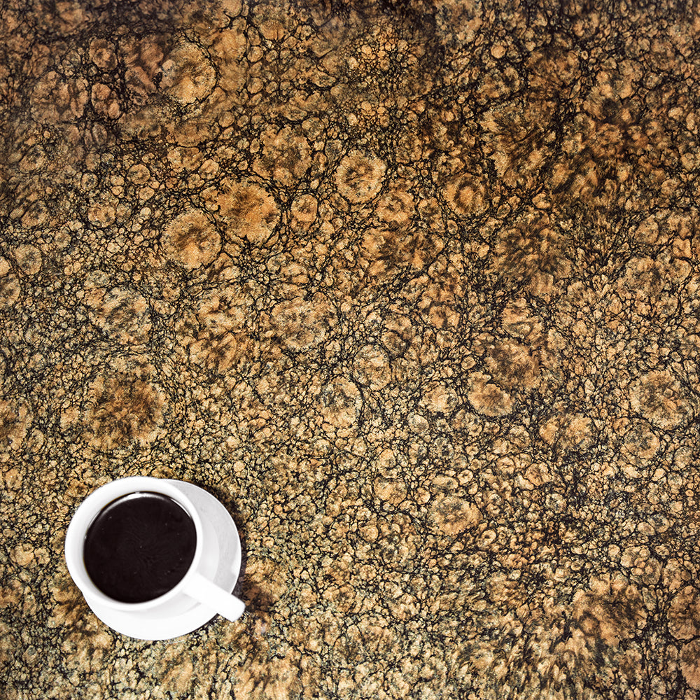 Baltic Brown Countertop with a cup of coffee