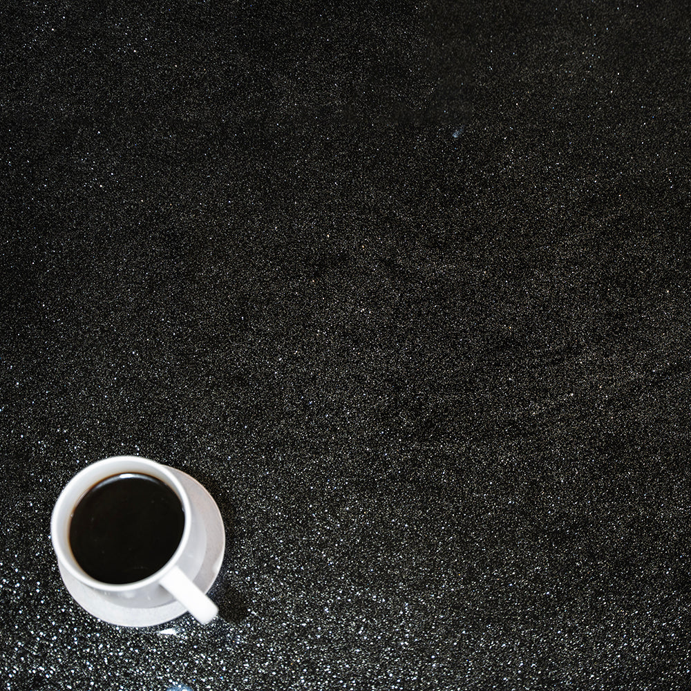 Black Galaxy Countertop with a cup of coffee