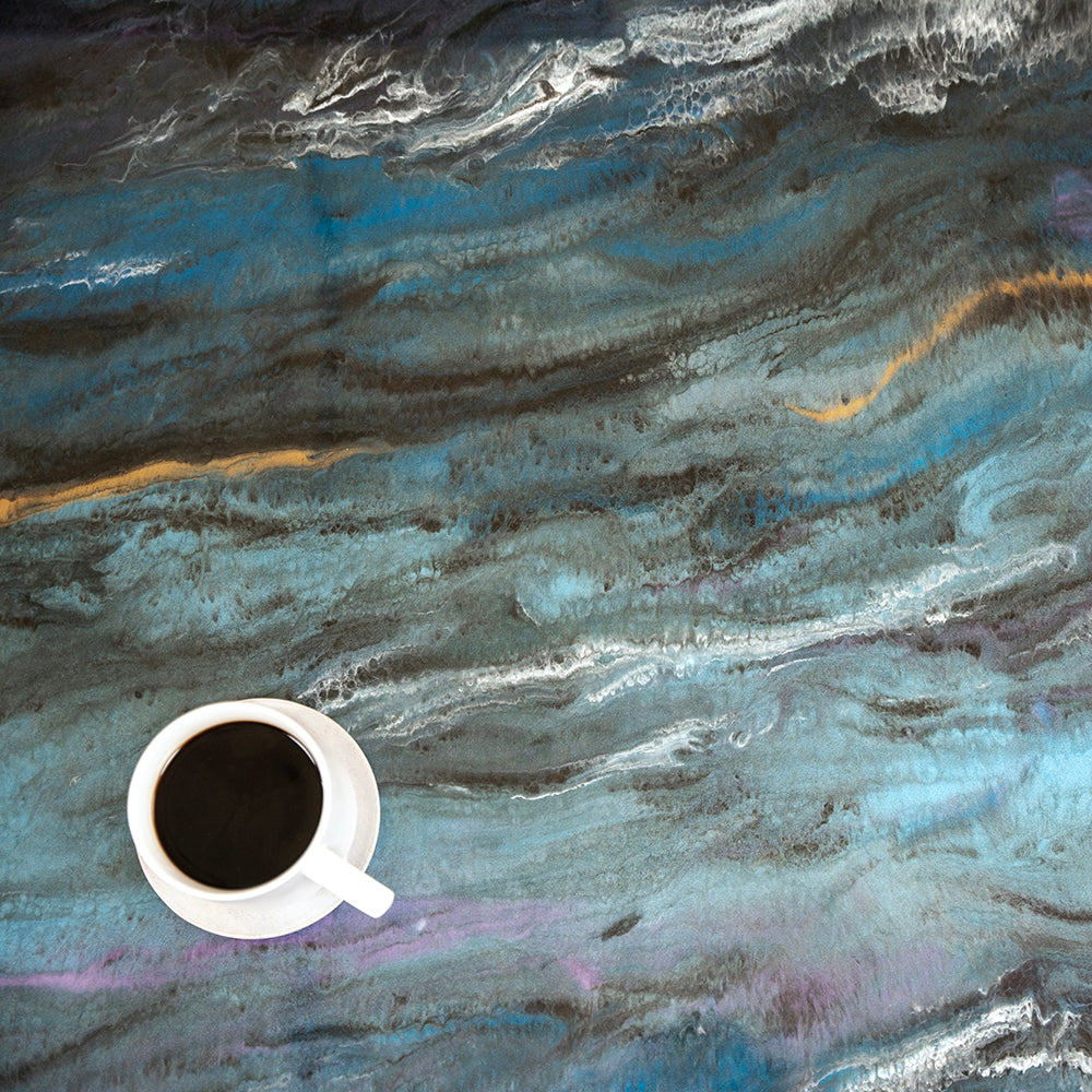 Blue Fracture Granite countertop with a cup of coffee