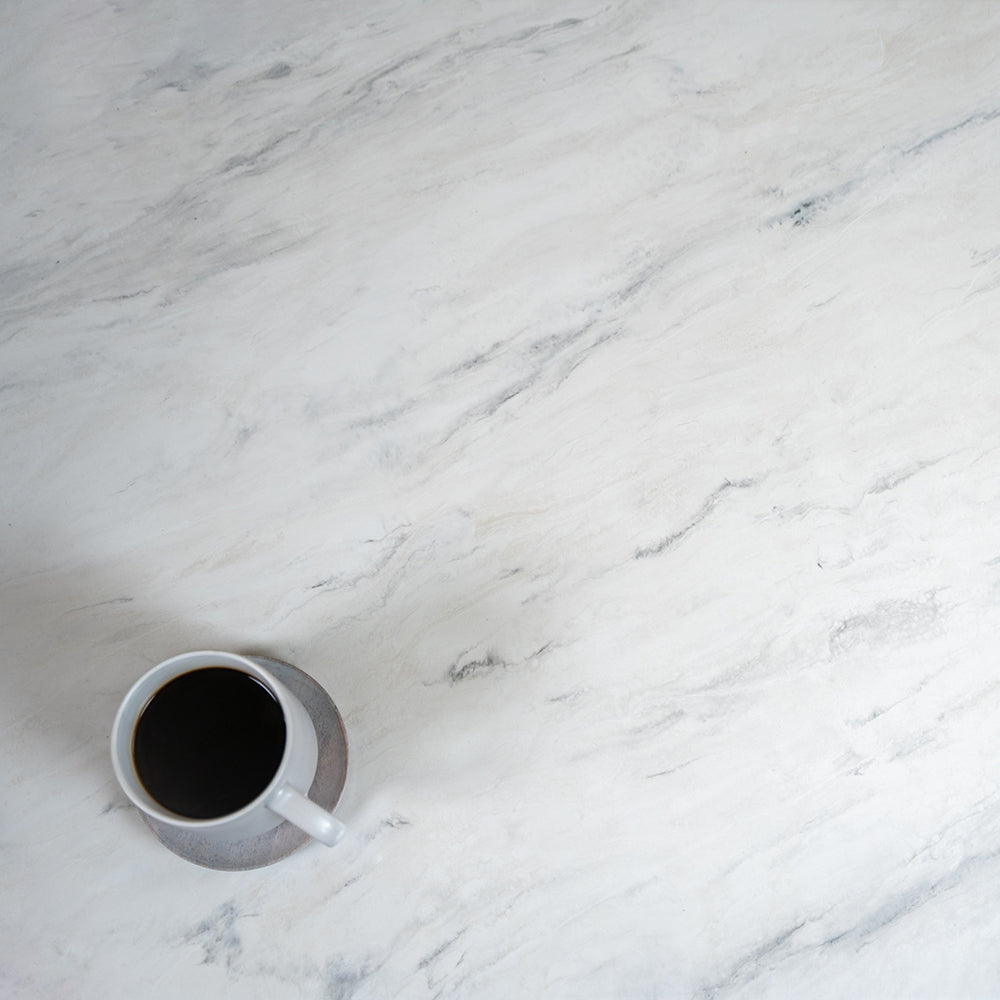 Carrara Marble Countertop with a cup of coffee