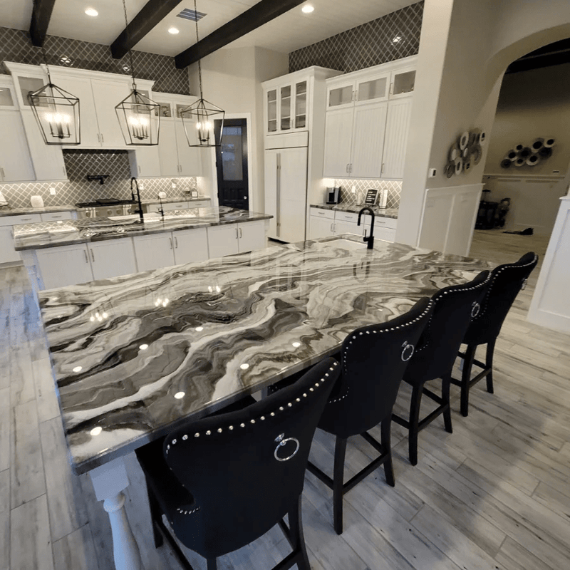 Modern kitchen with marble epoxy countertop and black bar stools