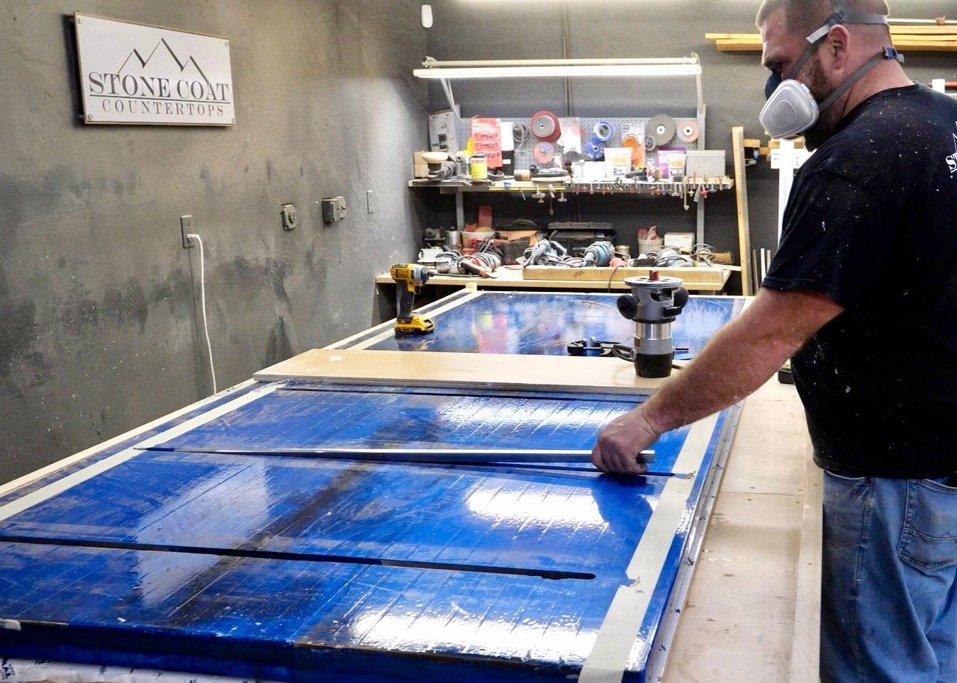 insert steel rods on underside of epoxy river table