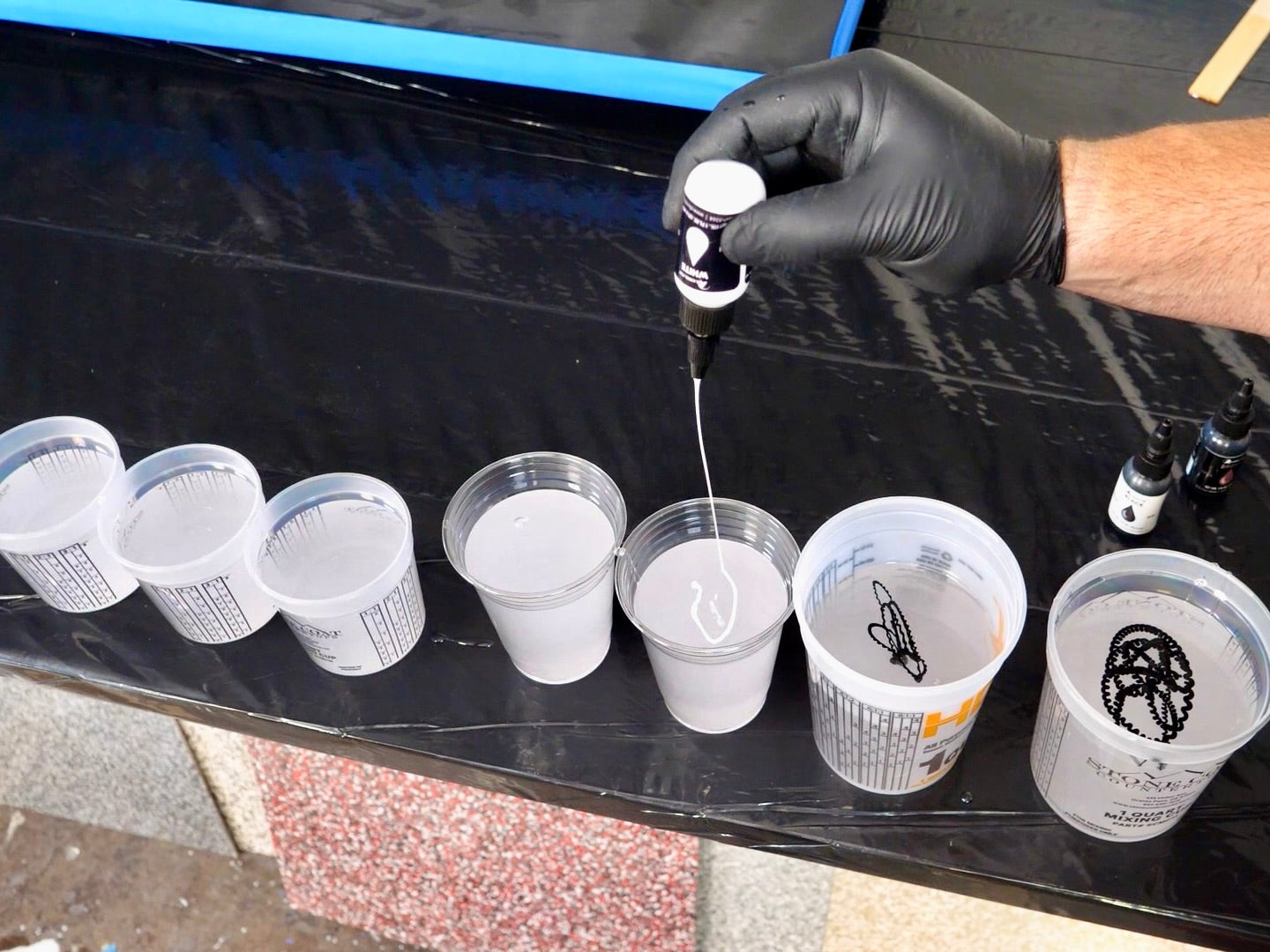 epoxy divided into cups for tinting