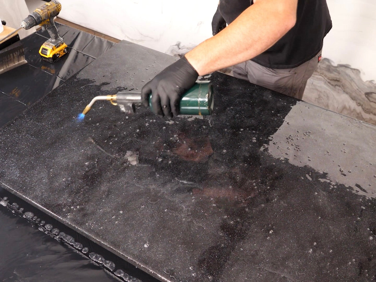 torch epoxy surface to remove bubbles