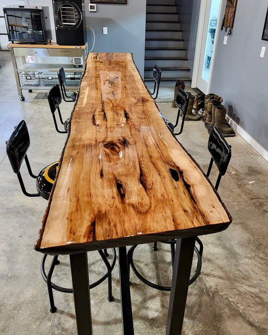 Epoxy topcoat on a tong wood grain table