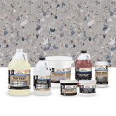 Collection of Stone Coat epoxy products on a terrazzo floor background