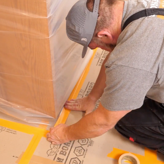 Worker yellow tape on a job site