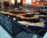 blackand gold epoxy kitchen island