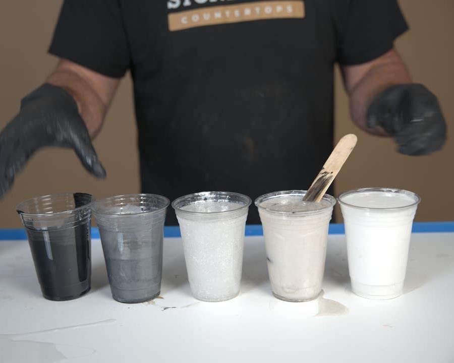 separate epoxy into cups for tinting