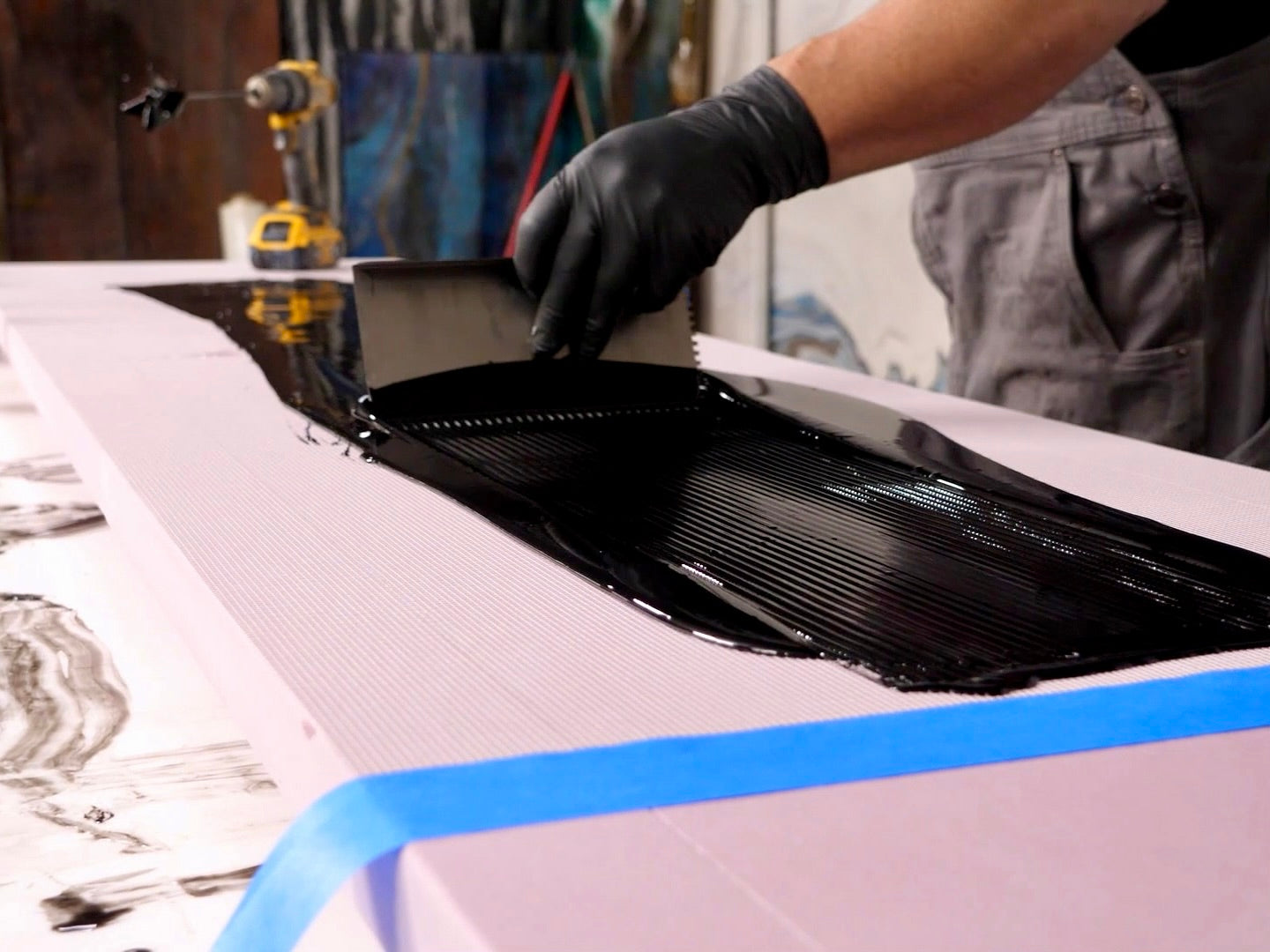 spread base epoxy layer over foam panel